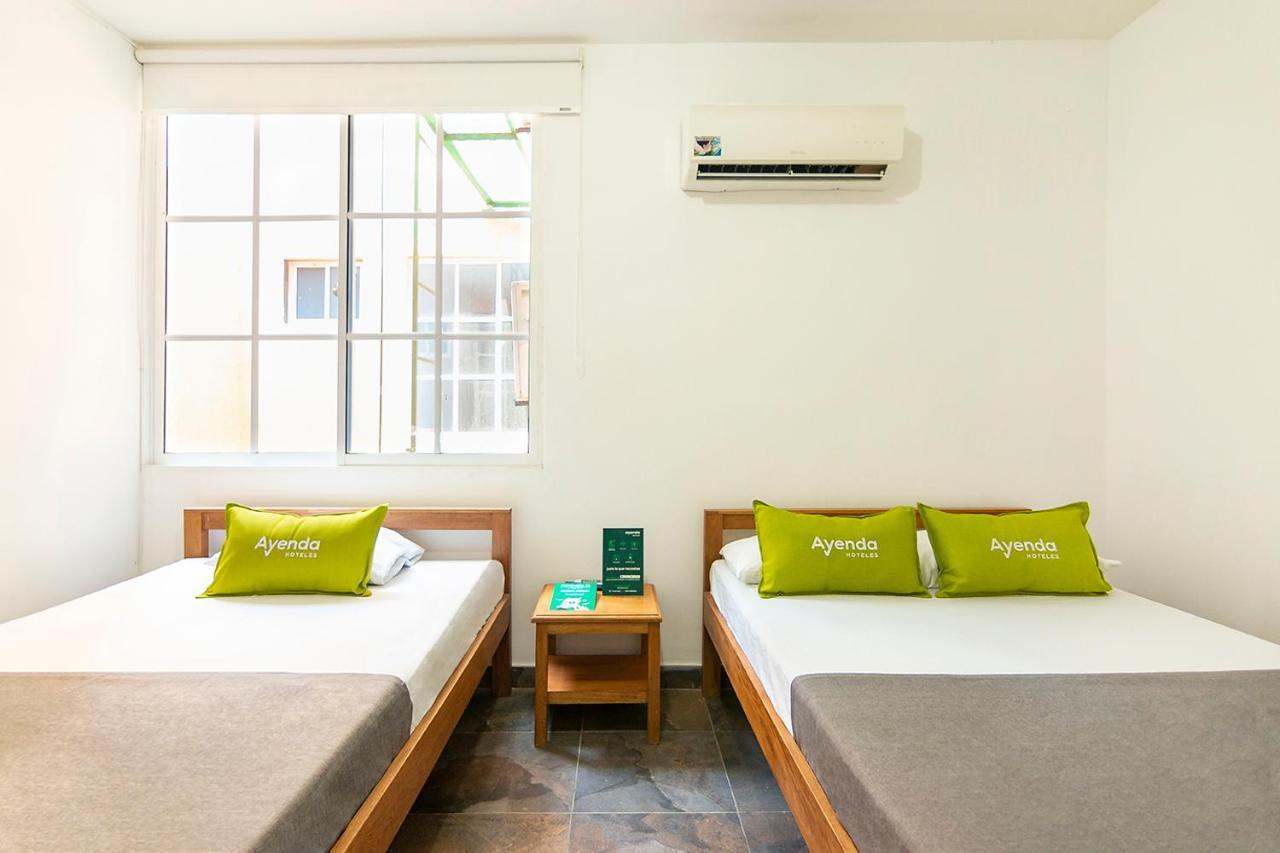 Ayenda 1611 Palm Bay Hotel ซันตามาร์ตา ภายนอก รูปภาพ